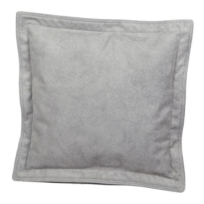 Coussin décoratif avec passepoil